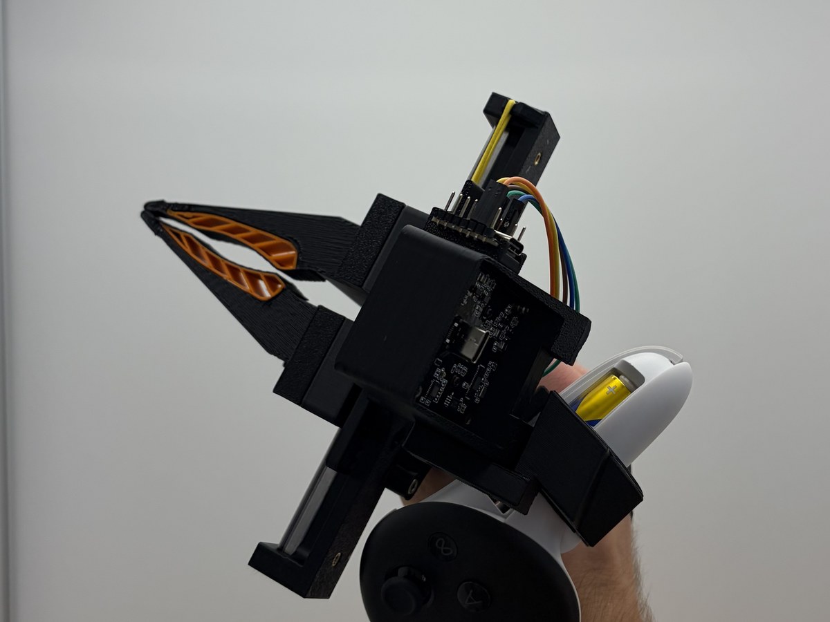 The same view with the jaws closed; the gripper has turned with the hand.